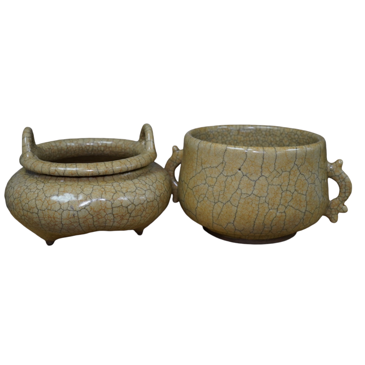 Two buff coloured crackle glazed censers including a tripod example, largest 17cm wide. Condition - good